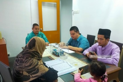 5. The team doing their first Friday 'tazkirah' at the  office